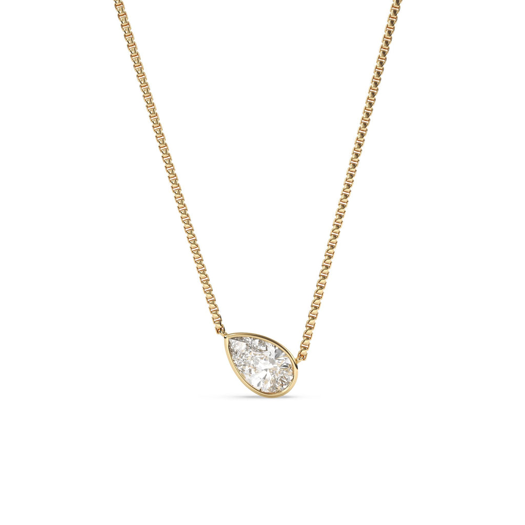 Karen - bezel set pear shape diamond pendant